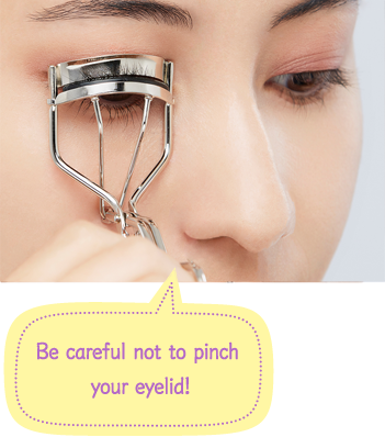 Be careful not to pinch your eyelid!